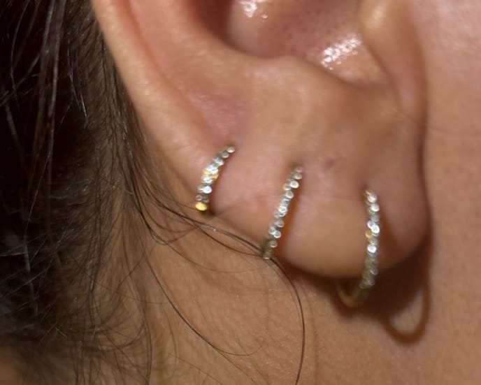 Customer photo review of Piercing Infinity con Zirconias Titanio