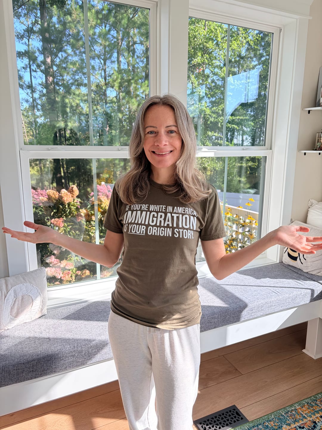 Customer photo review of If you're white in America, IMMIGRATION is your origin story Unisex Tee