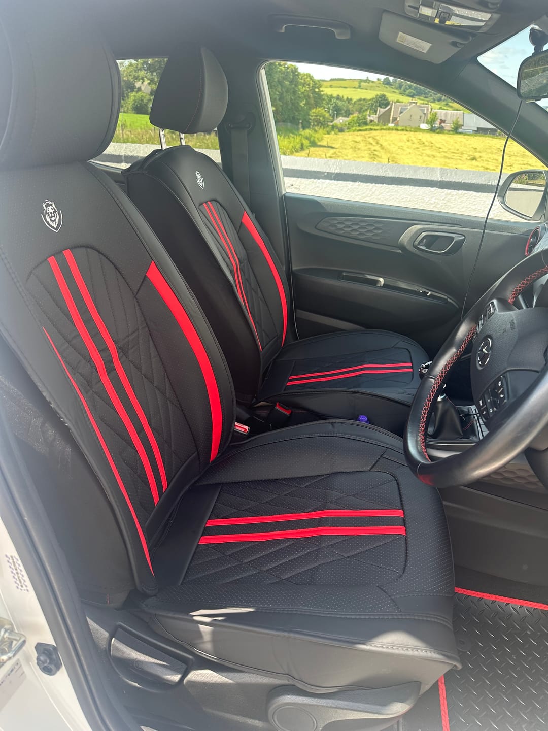 Irene S.'s car with Red & Black seat covers