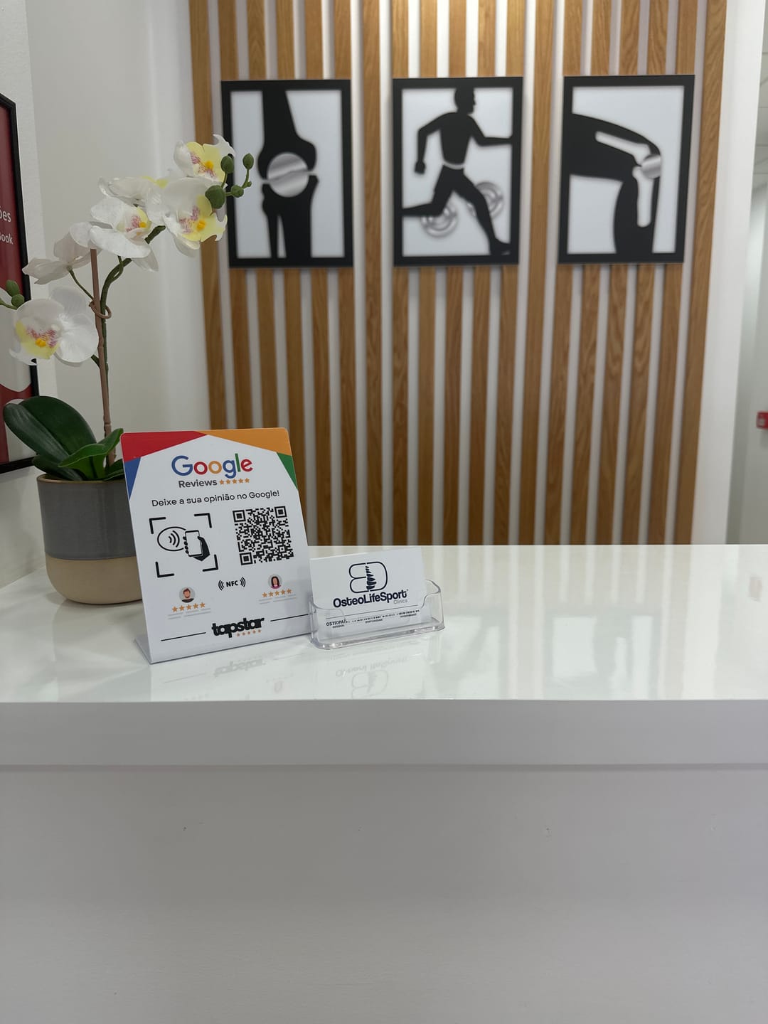 Customer photo review of Expositor de Avaliações Google