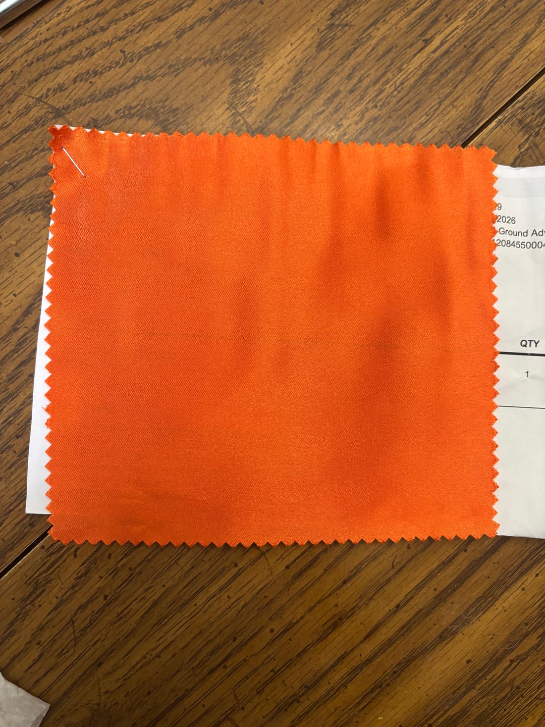 Customer photo review of Orange Silky Stretch Satin