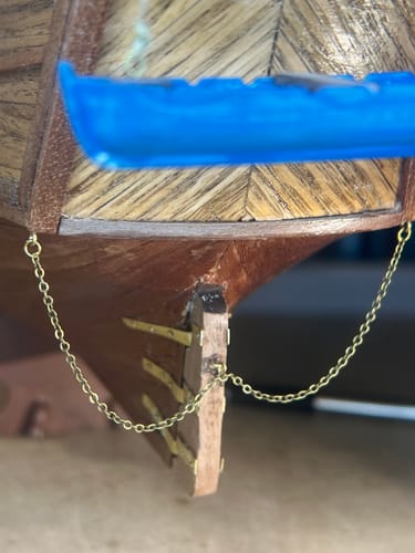 Customer's Albatros Color Pack model, close-up of the stern with wooden planking and delicate metal chains.