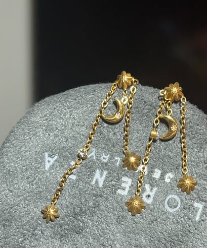 Customer photo review of Par Arete Estrella Con Triple Cadena