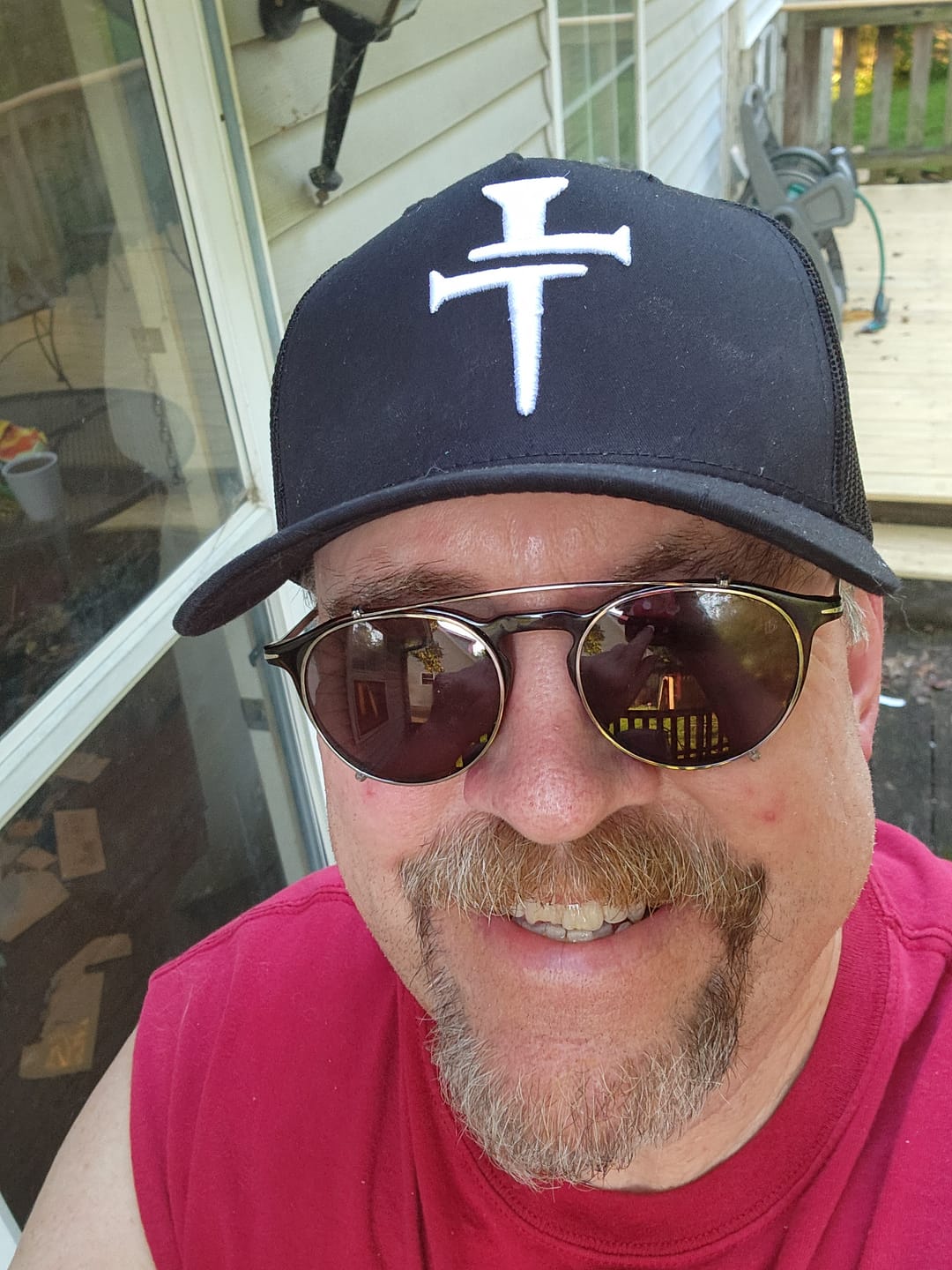 Customer photo review of DGO Cross of Nails Embroidered Trucker Hat