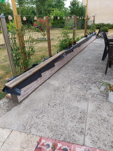 Customer photo review of Parement Mural Brique Gris Béton - Imitation Pierre 3D - 100 x 50 CM
