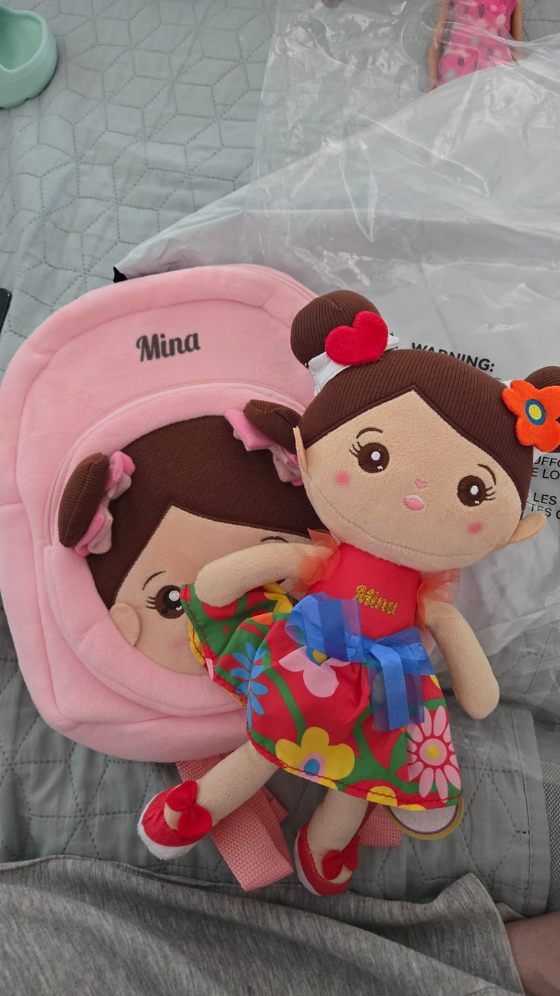 Customer photo review of Personalisierte Plüschpuppen mit Offenen Augen im Braune Haut & Rotes Blumenkleid
