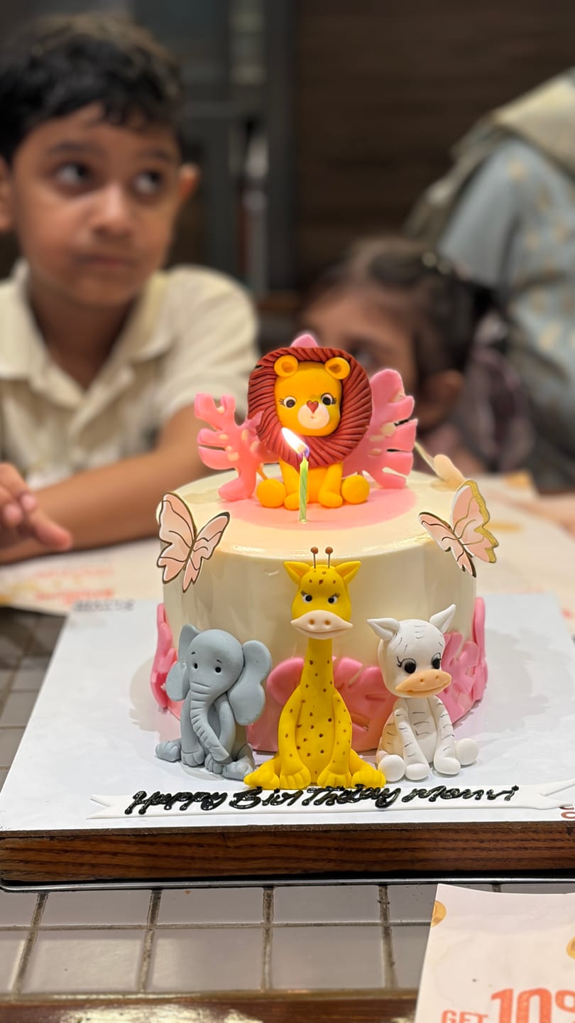 Customer photo review of Jungle theme pink Cake