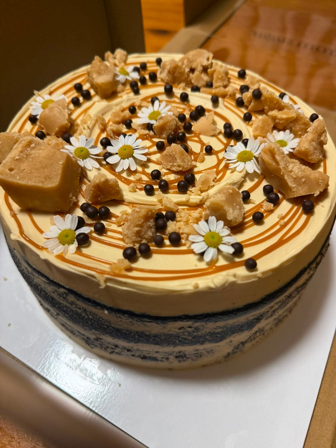 Customer photo review of chocolate caramel cake