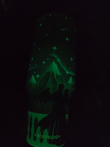 Customer's Thicc Buddy 40oz mug glowing in the dark with green mountain and star patterns