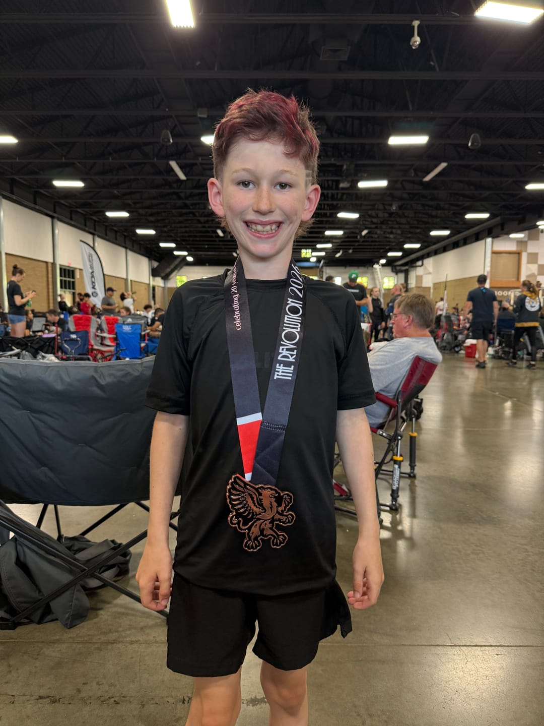 Customer photo review of Standard Black Short Sleeve No-Gi Kids BJJ Rash Guard