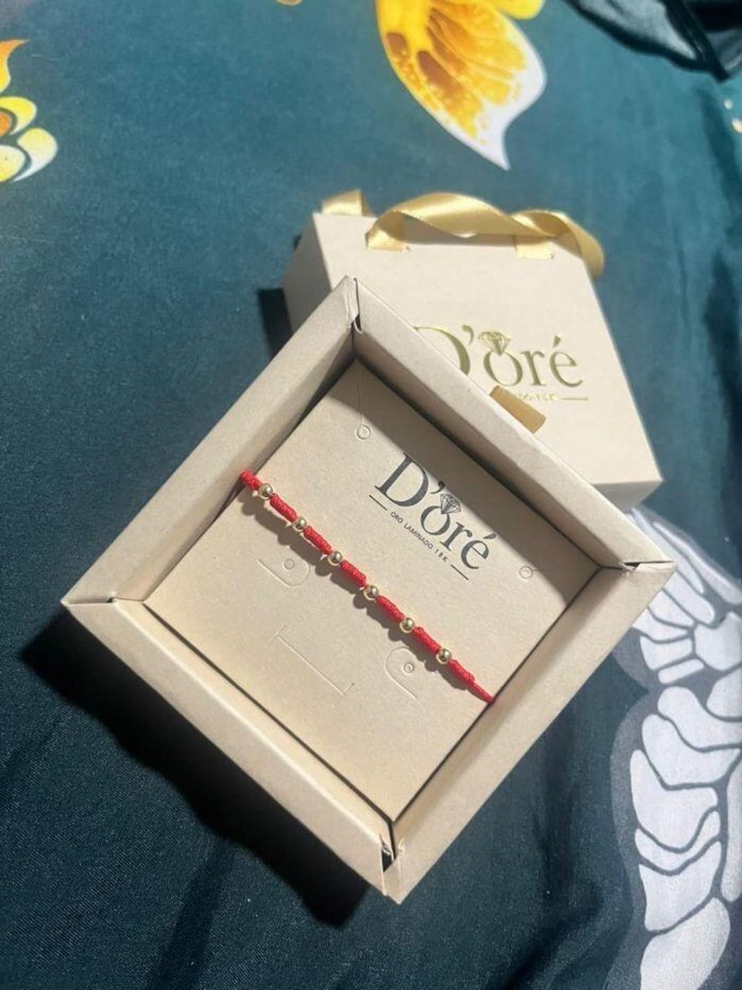 Customer photo review of Pulsera protección 7 Nudos Oro Laminado 18K ✨