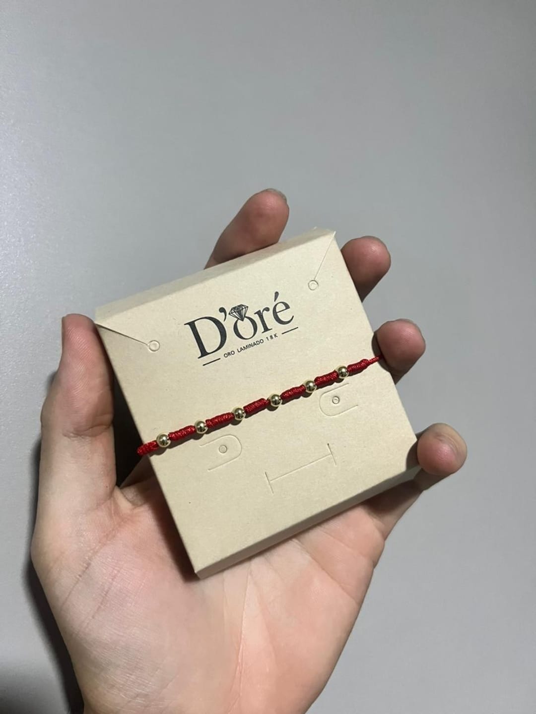 Customer photo review of Pulsera protección 7 Nudos Oro Laminado 18K ✨