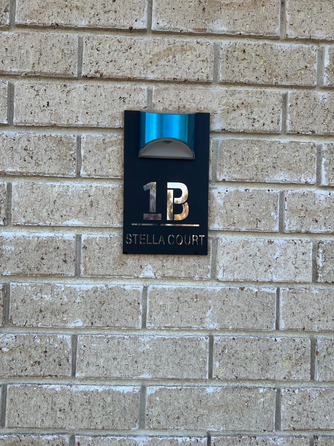 Customer photo review of WhareLite™ | Personalized Address Plaque