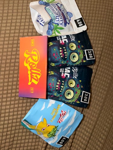 Customer's Montgomery Benz product packaging, included alongside other various product bags and a box.