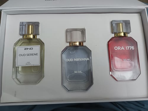 Customer's OUD Supreme Bundle set showing three labeled perfume bottles in a white presentation box.