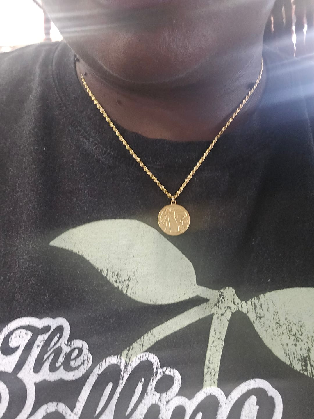 Customer photo review of Zodiac Coin Necklace w/ Rope Chain