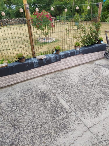 Customer photo review of Parement Mural Brique Gris Béton - Imitation Pierre 3D - 100 x 50 CM