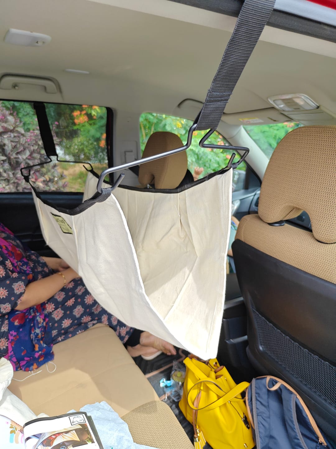 Customer photo review of CarNap - Portable Car Hammock for 0 to 3 year baby | with Adjustable Belt, Hammock Cloth, Hangers and Carry Bag | use at Car, Train, Home