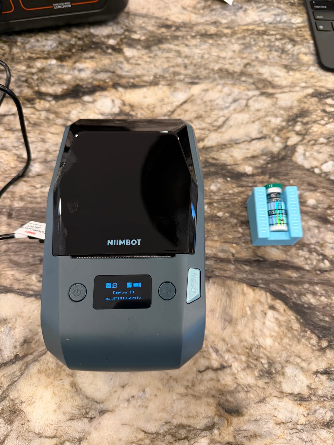 Customer photo review of NIIMBOT M2 Thermal Transfer Label Maker, Smart Color Printing with Phones & PC for Office, Lab, Vial Bottle