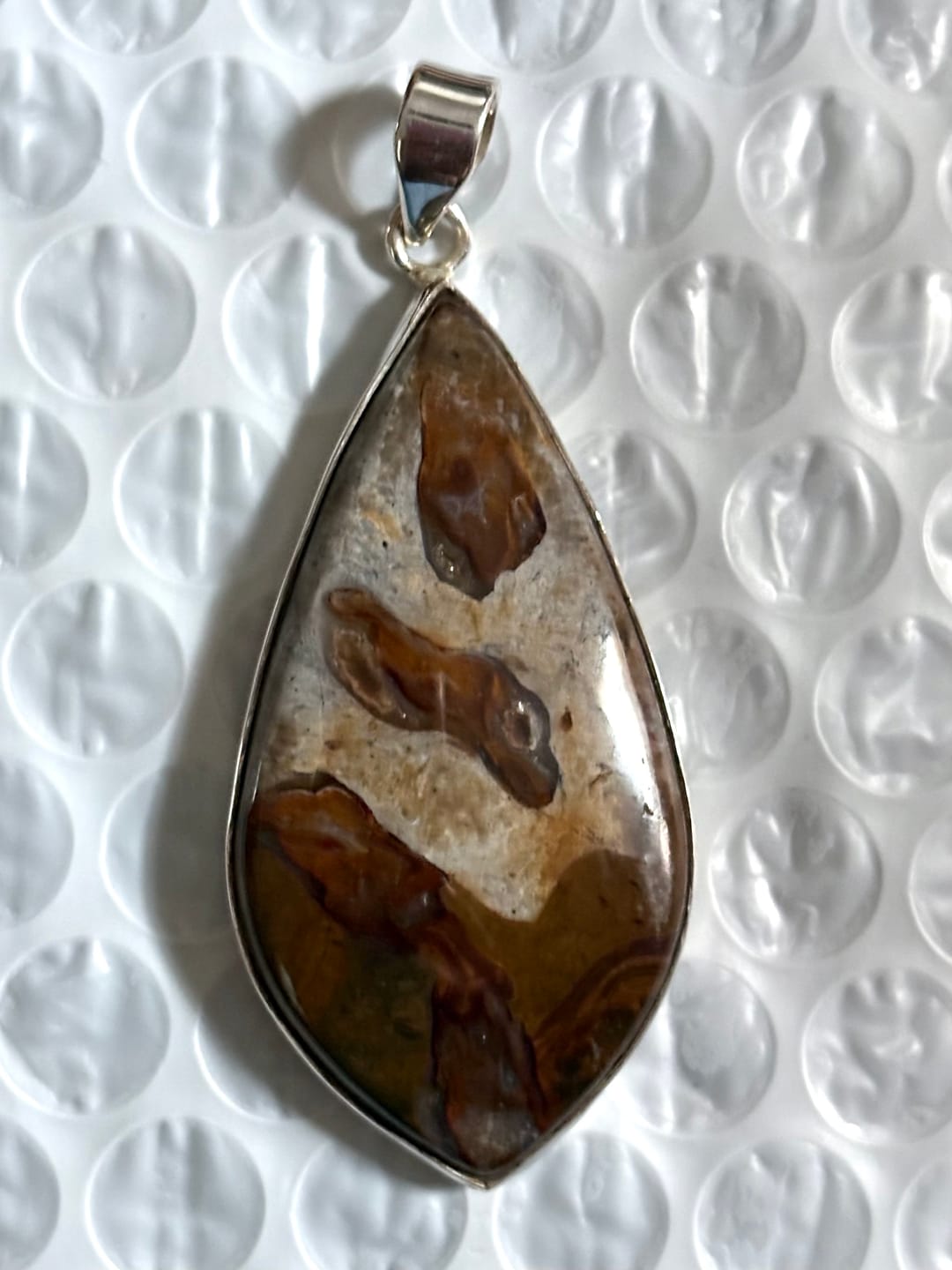 Customer photo review of Premium Rock Calcy Pendant 2 3/8" (.925 Sterling Silver)