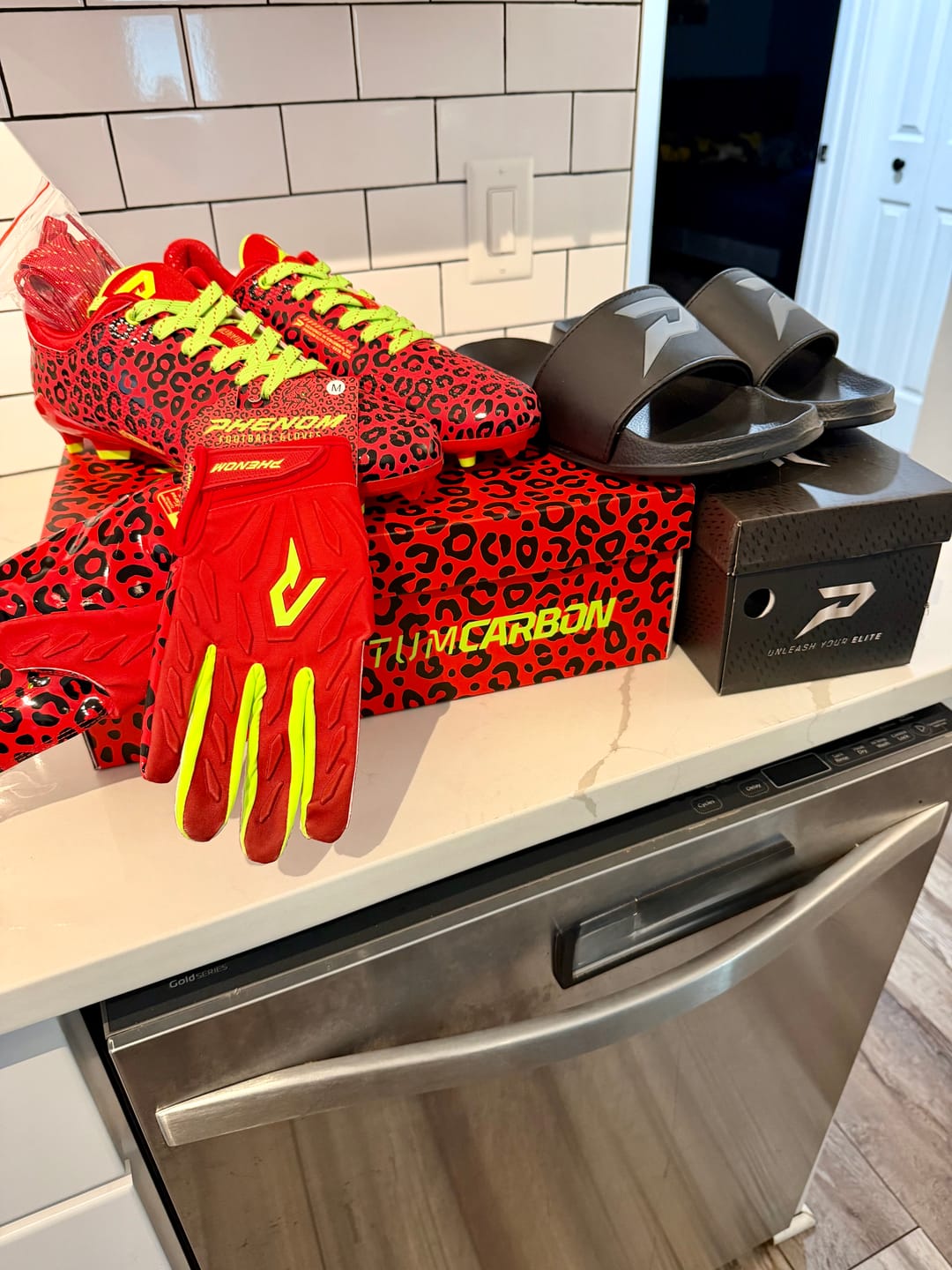 Customer photo review of Phenom Elite Quantum Carbon Football Cleats – Red Leopard