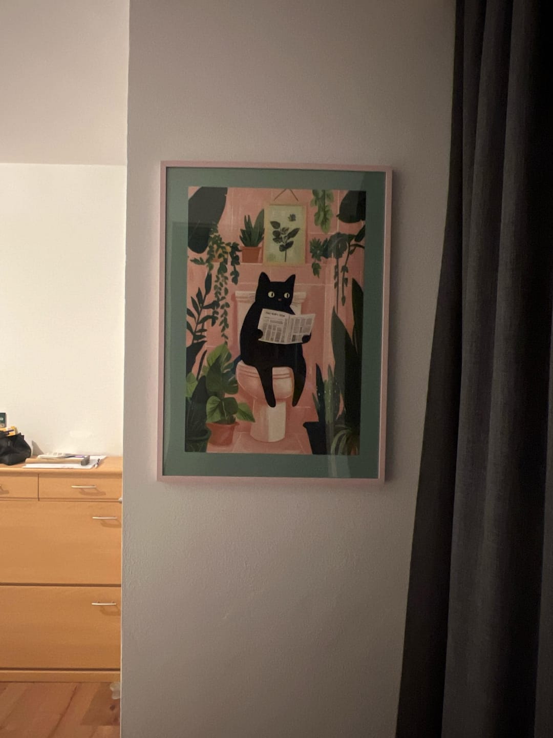Customer photo review of Black Cat Bathroom Canvas Wall Art – Funny Cat Newspaper Print