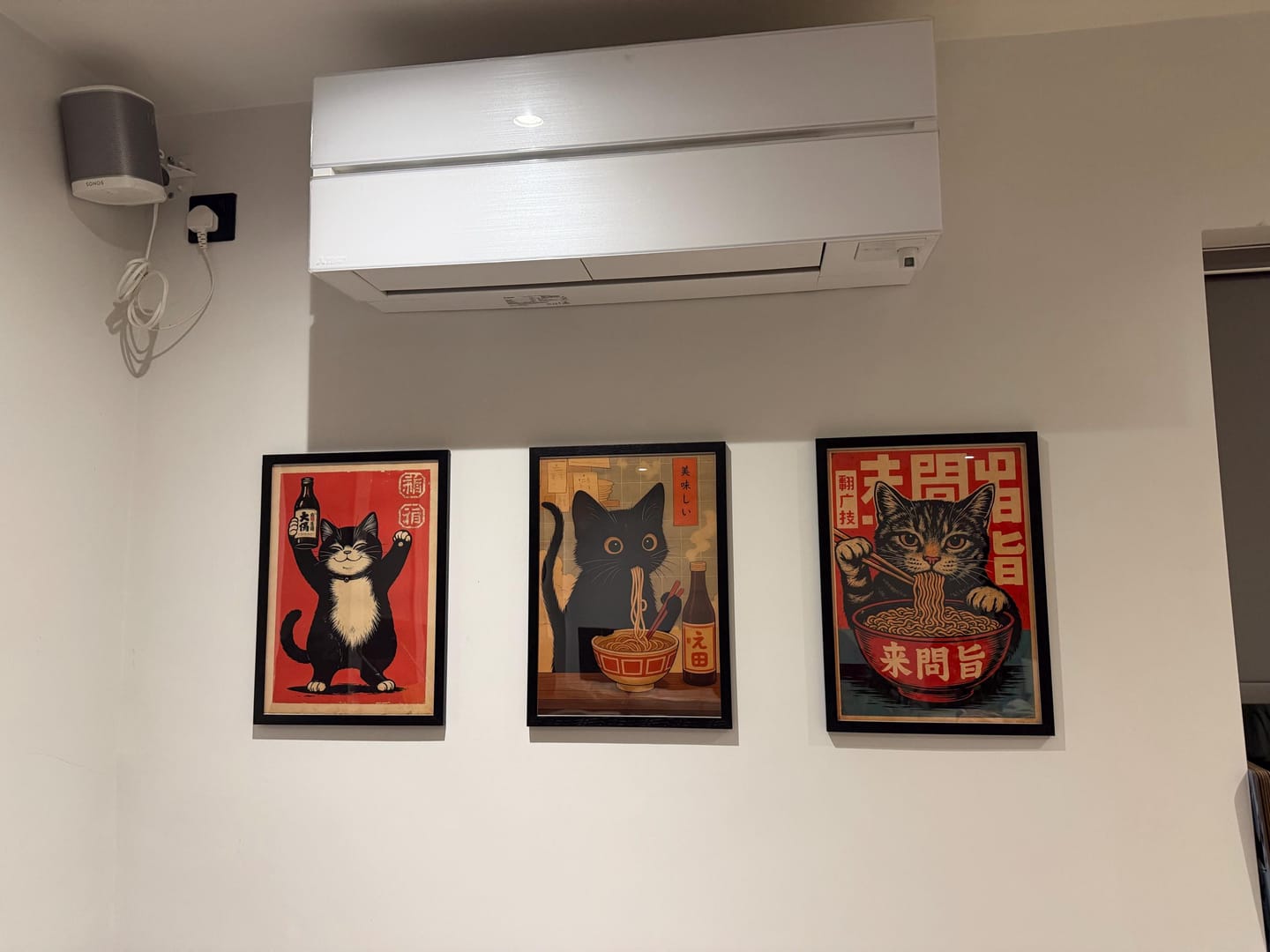 Customer photo review of Black Cat Eating Ramen Canvas Wall Art