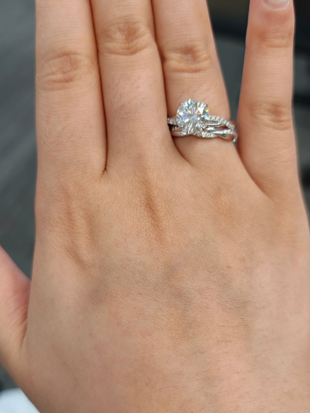 Customer photo review of S925 Moissanite 2.0 Carat Round Cut Twist Wedding Ring Set For Everyday Wear