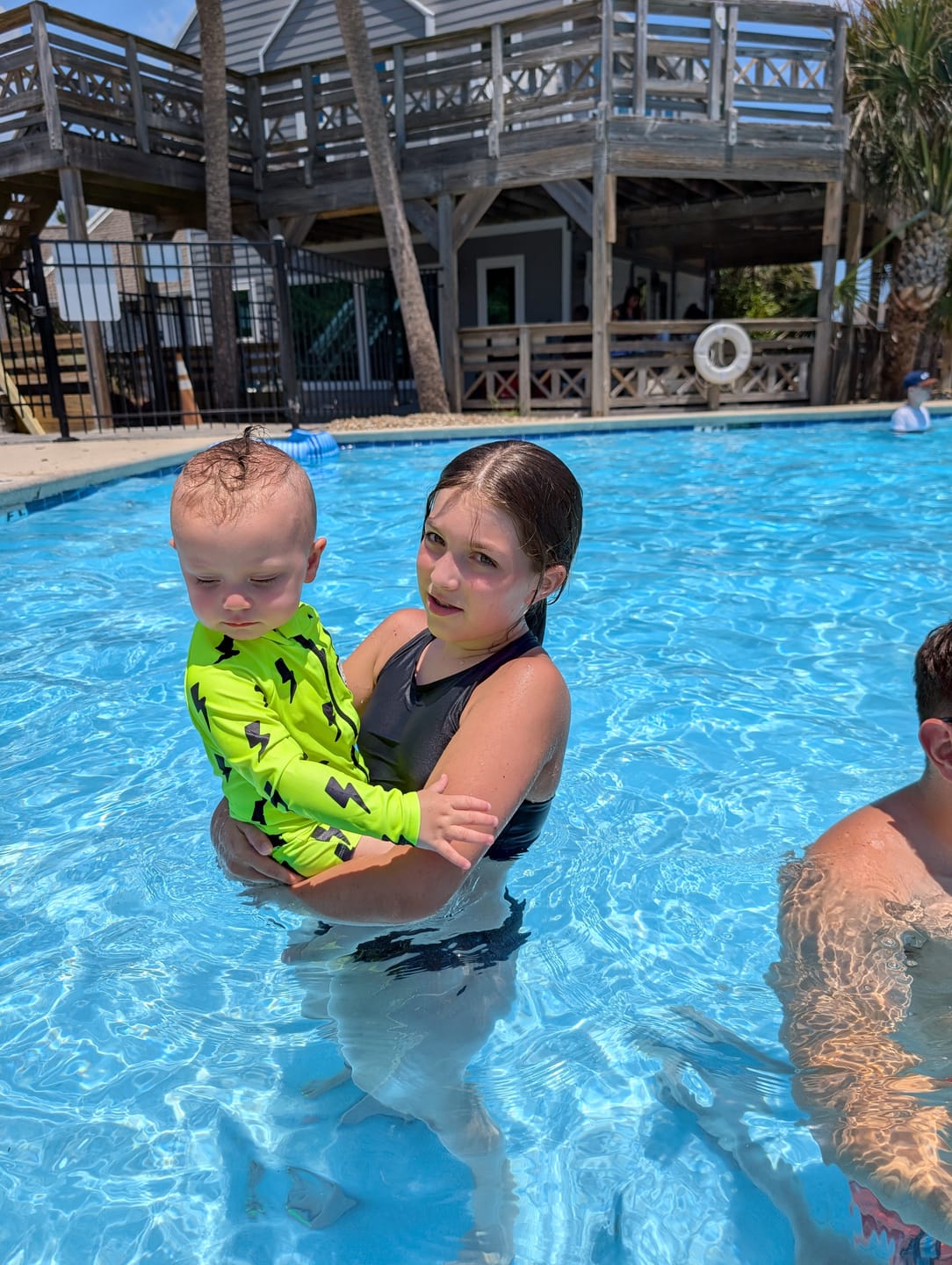 Customer photo review of UPF50+ Boys Swim Romper in Neon Electric Lime x Jagger