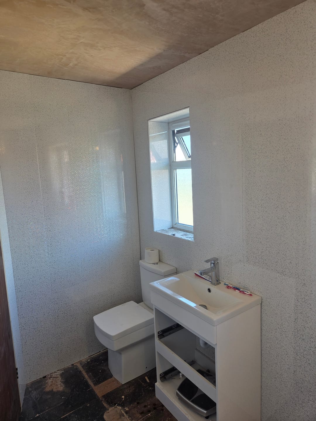 Customer photo review of 8mm Platinum White Sparkle Bathroom Wall Panel 1M x 2.6M