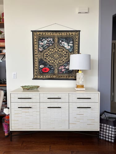 Reviewer's Wayside Silky Scarf displayed as decorative wall art above a white sideboard.