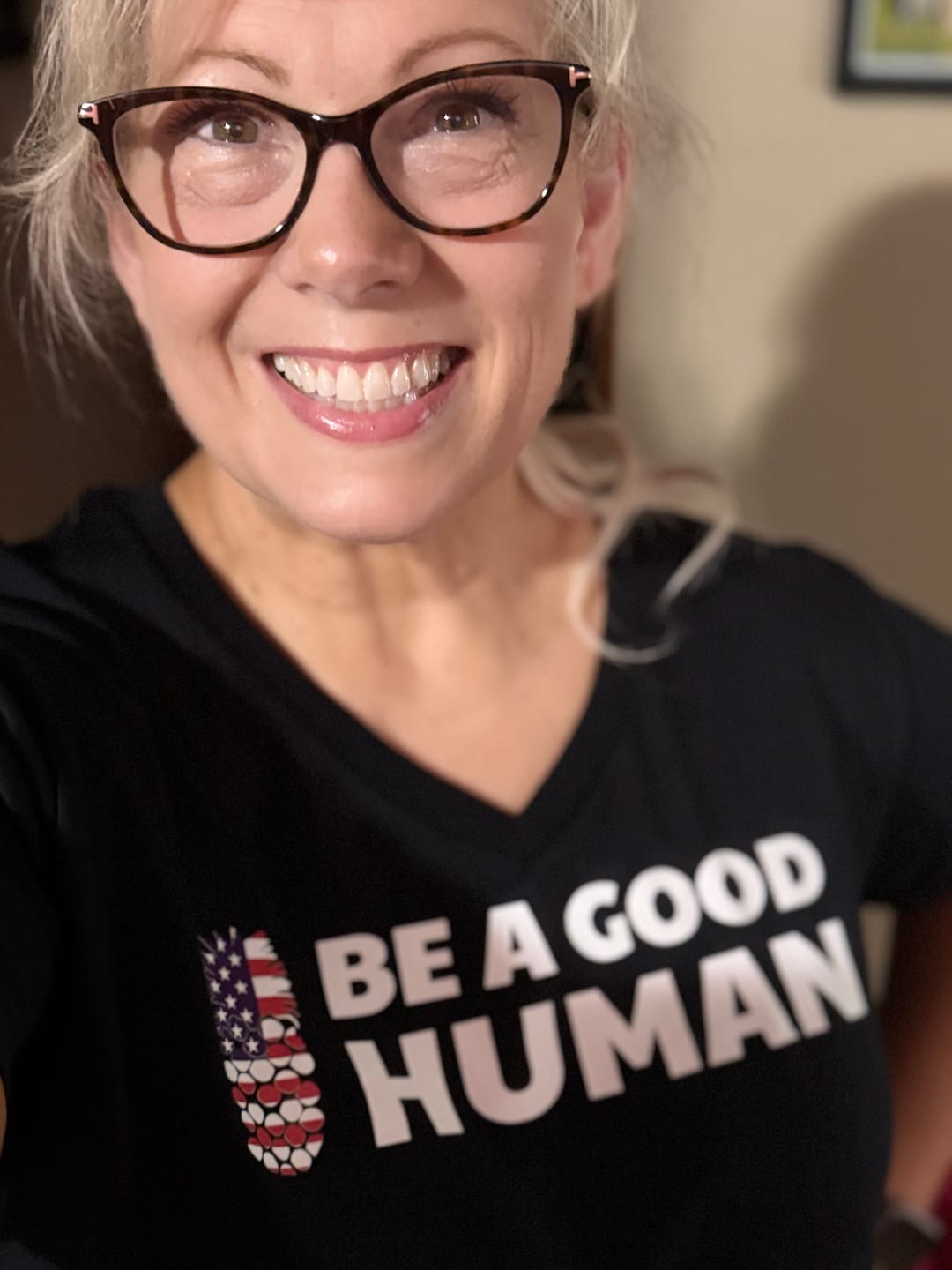 Customer photo review of Be A Good Human American Flag WOMEN'S V-NECK