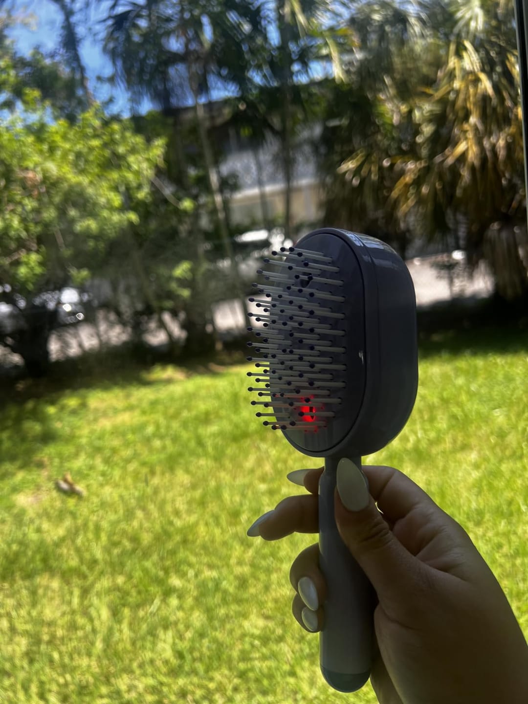 Customer photo review of ICONIC™ 4-in-1 Electric Hair Straightener Massage Keratin Brush