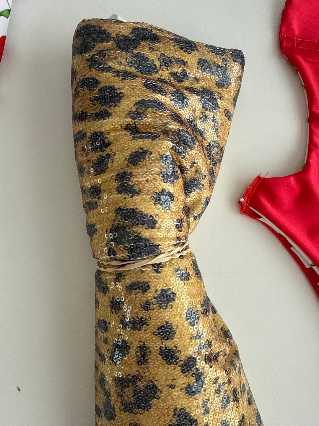 Customer photo review of Olive Green Leopard Sequin Fabric by the Metre