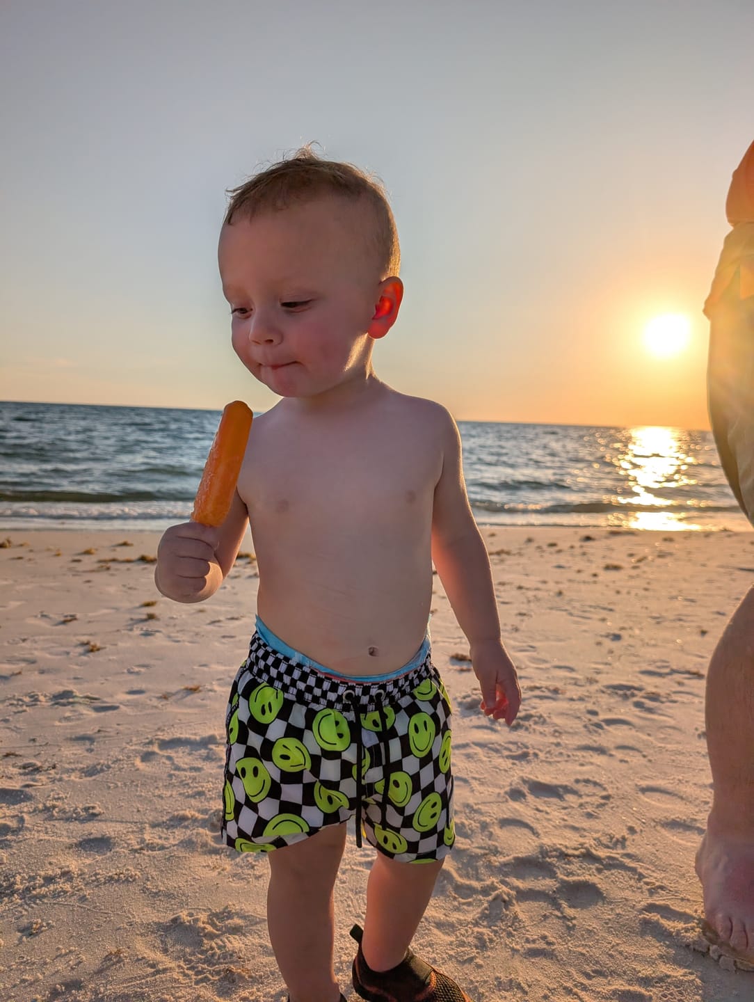 Customer photo review of Hybrid Swim Trunks in Neon Electric Lime Smileys