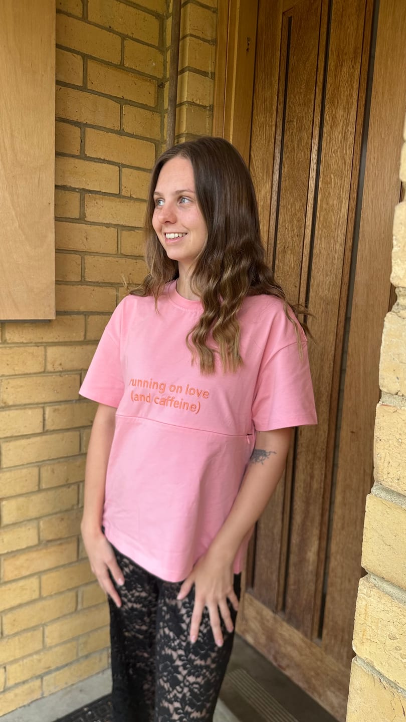 Customer photo review of Pink Breastfeeding Tee with Hidden Zip – "Running on Love (and caffeine)"