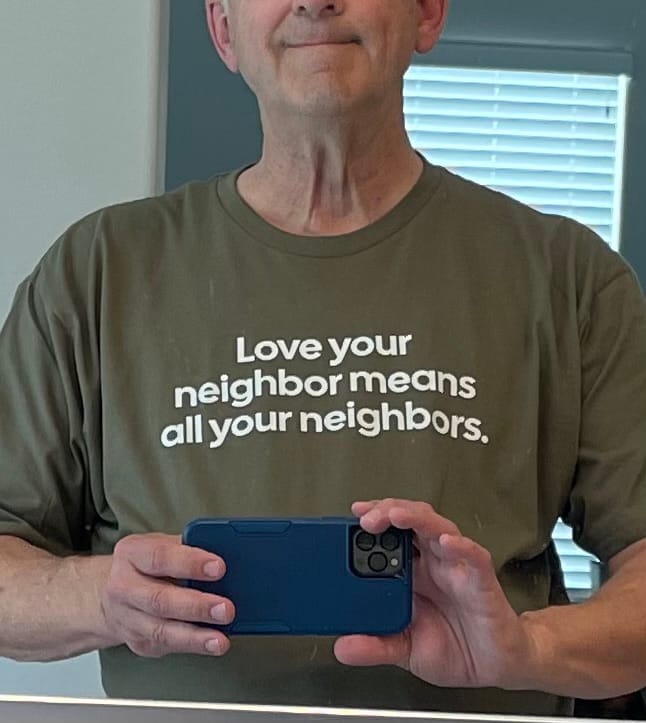 Customer photo review of Love Your Neighbor Means All Your Neighbors Unisex Tee