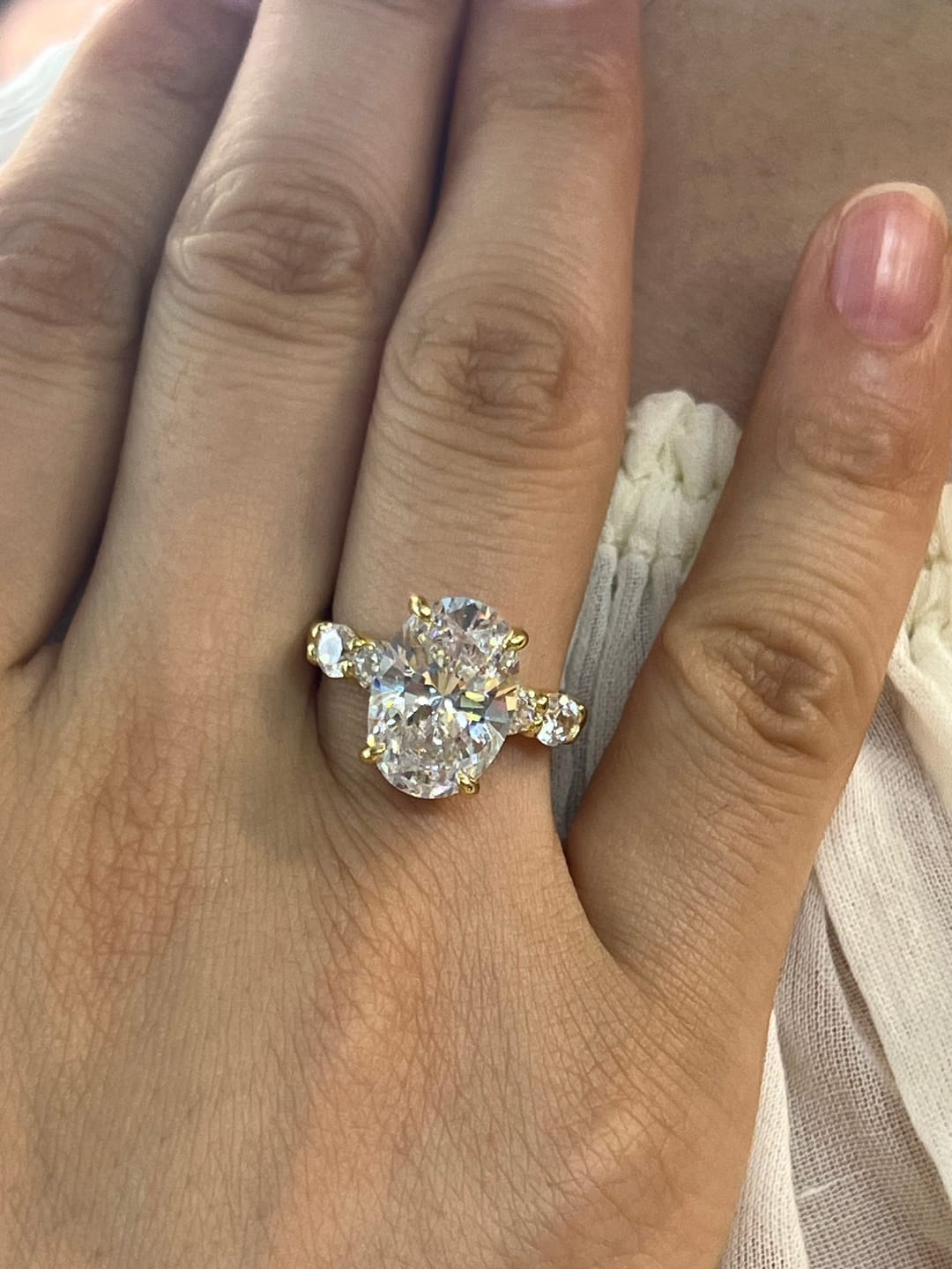 Customer photo review of S925 Hidden Halo 5.5Ct Oval Cut Side Stone Engagement Ring Anniversary Ring Gift