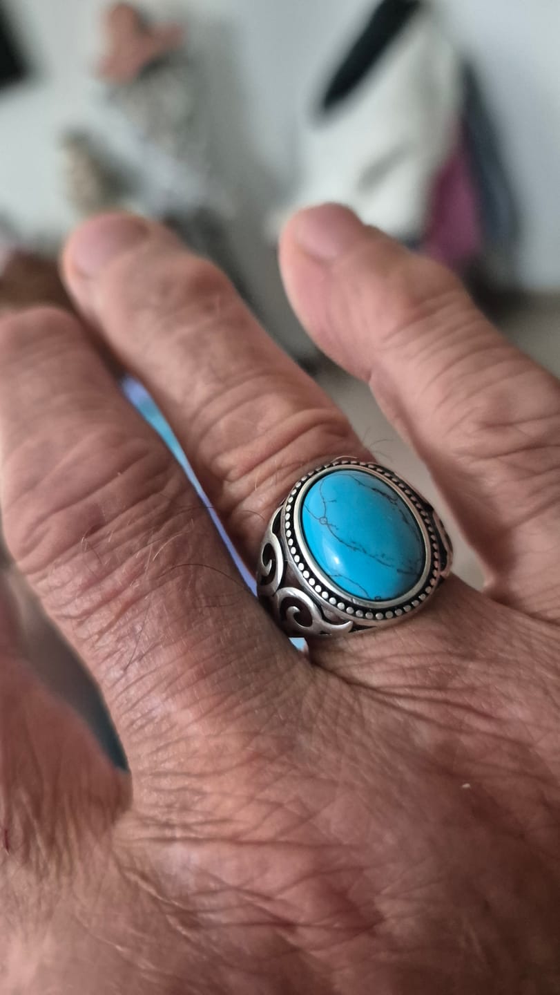 Customer photo review of BLUE EYES. - 925 STERLING SILVER