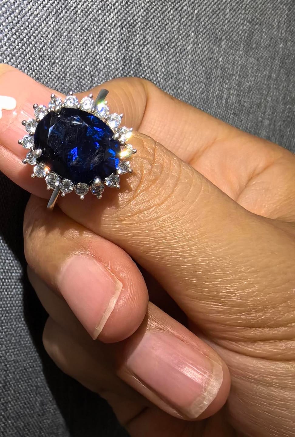Customer photo review of 4.5 Carat Halo Oval Cut Blue/Red/Green/Yellow Sapphire Engagement Ring In Sterling Silver