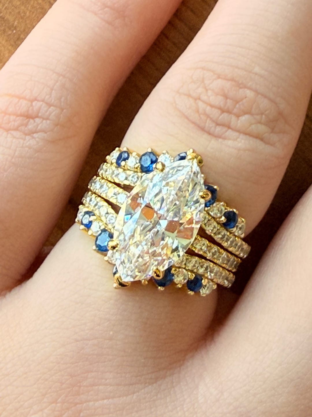 Customer photo review of S925 2PC 3.5Ct Marquise Cut Enhancer Wedding SetsHalf Enternity Yellow Gold Engagement Ring with Blue & White Stone Enhancer Wedding Band