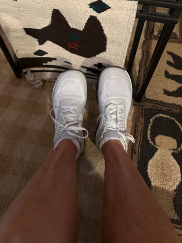 Customer's top-down view of the white CUURT Muuv shoes, highlighting the wide toe box.