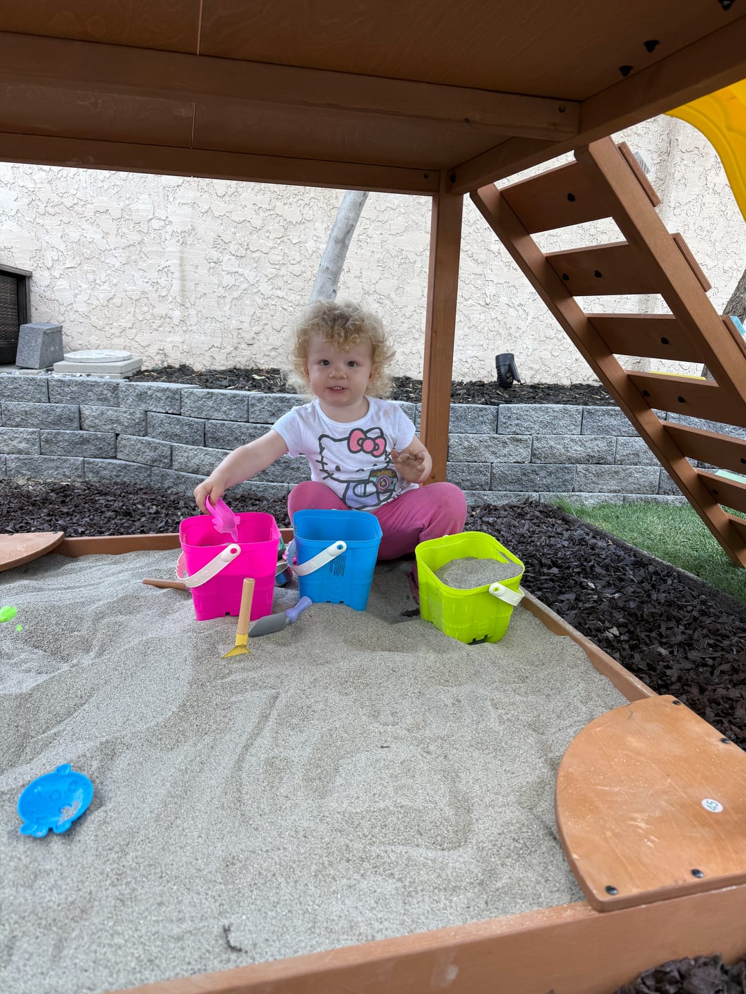 Customer photo review of Mimosa Wooden Outdoor Playhouse with Slide, Climbing Stairs & Sensory Gear Panel