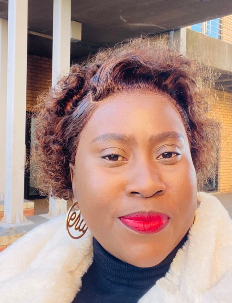 Customer photo review of Gold Luxe Logo Hoops