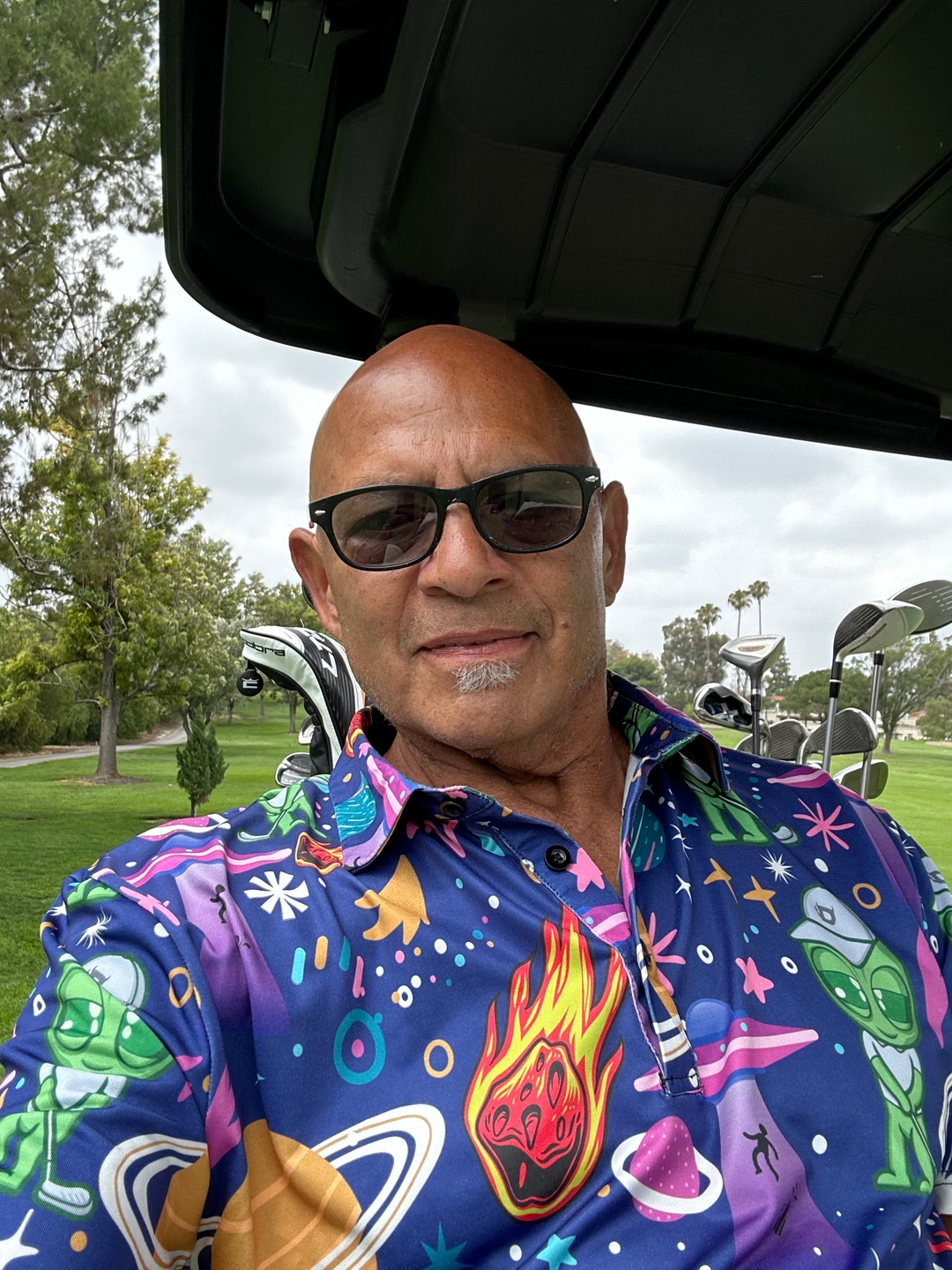 Men's alien and star golf polo golf outfit inspiration from Golf Gentry