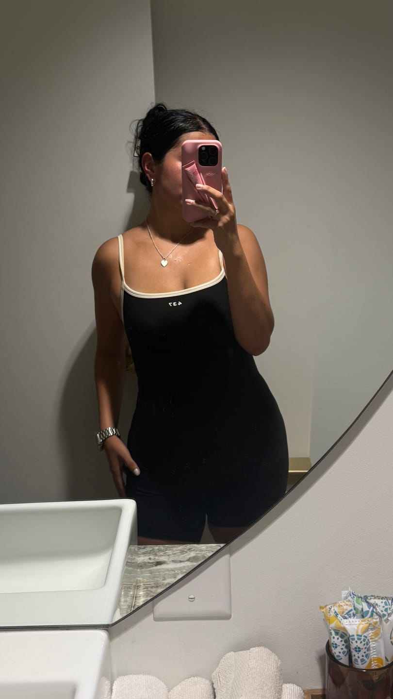 Customer photo review of The Shorts Onesie Black & Cream