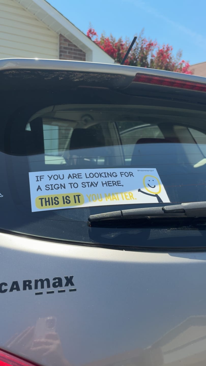 Customer photo review of Happiness Bumper Sticker