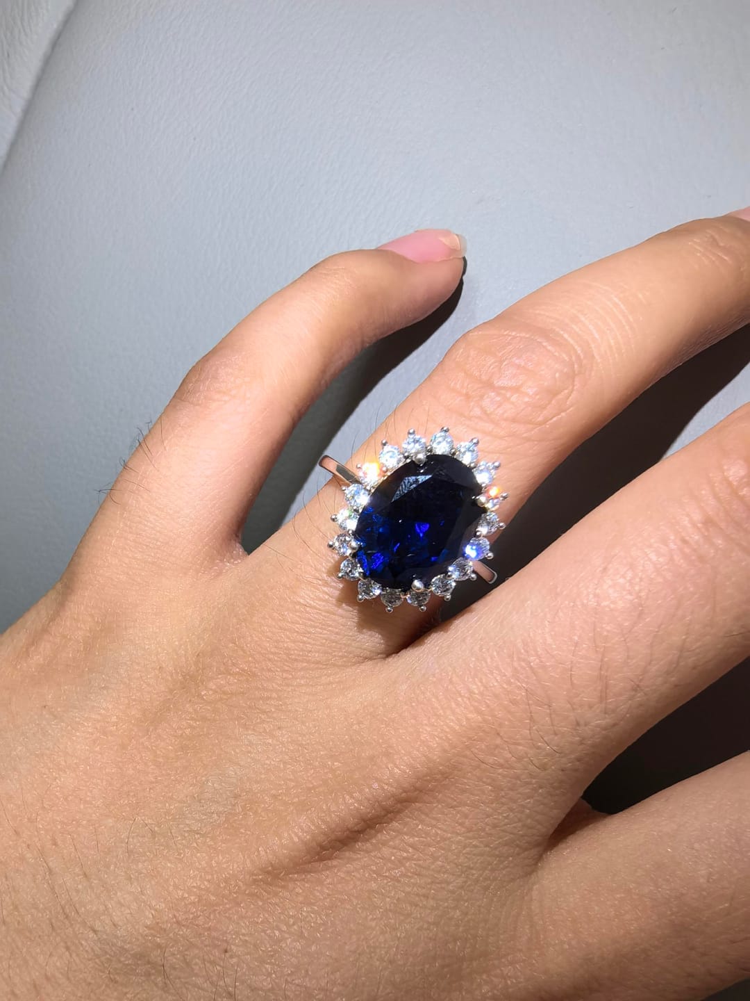Customer photo review of 4.5 Carat Halo Oval Cut Blue/Red/Green/Yellow Sapphire Engagement Ring In Sterling Silver