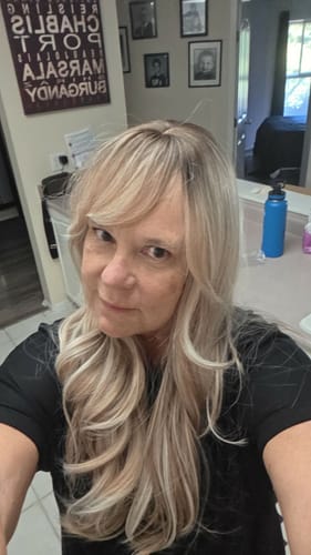 Customer photo review of JBEXTENSION 26 Inches Scalpiana Long Curly Light Mix Blonde 3.5X4 Hard Silky Top Natural Scalp Effect Wig with Bangs LISA LIGHT MIX BLONDE