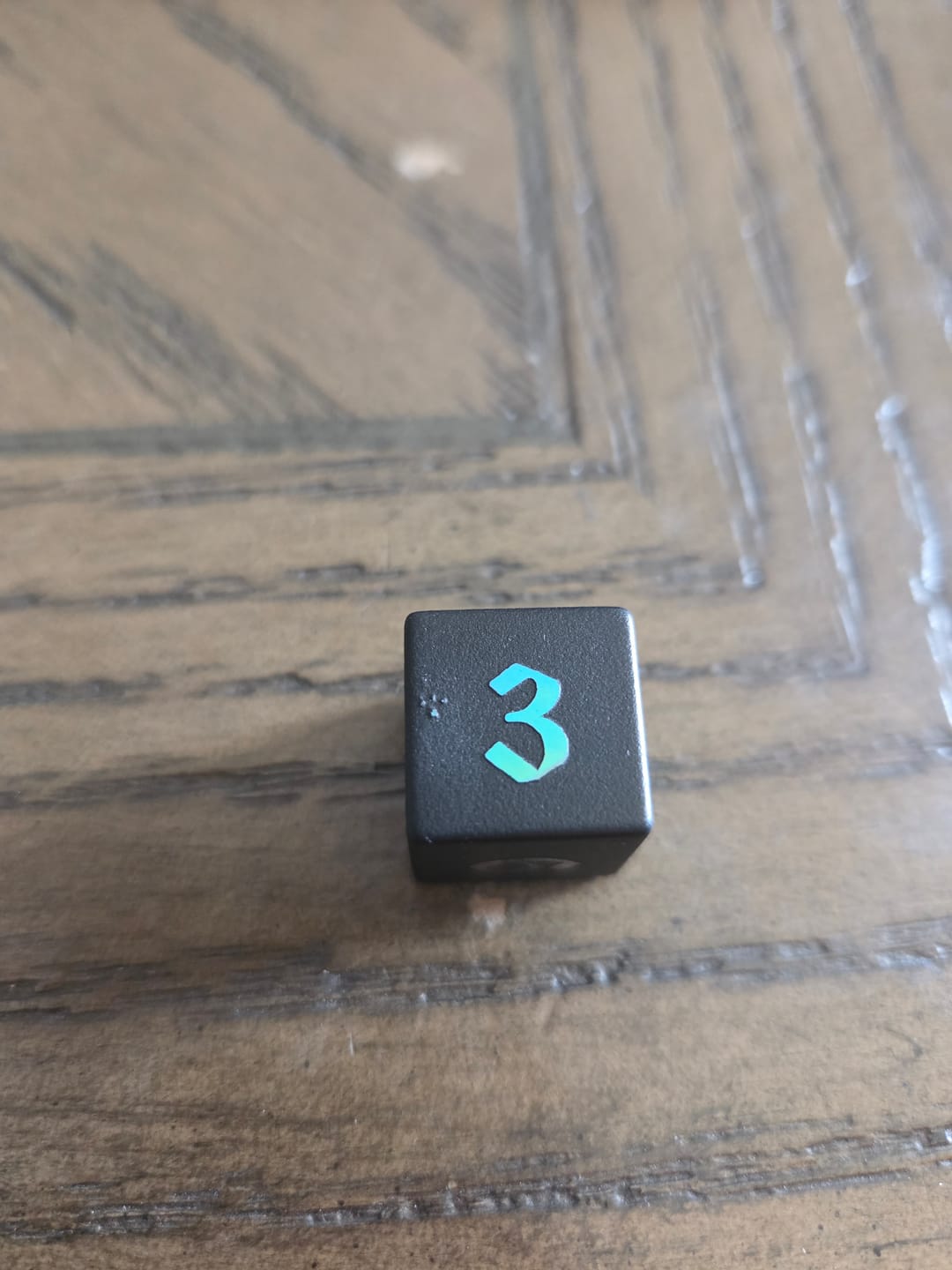 Customer photo review of Inked Black Night Raised Obsidian Hand Carved Dice DND Set